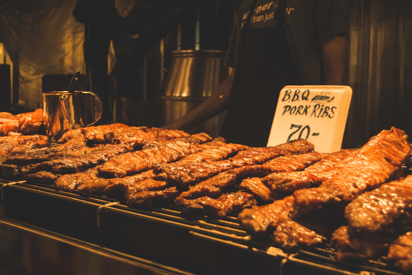 Barbecued pork ribs on a grill